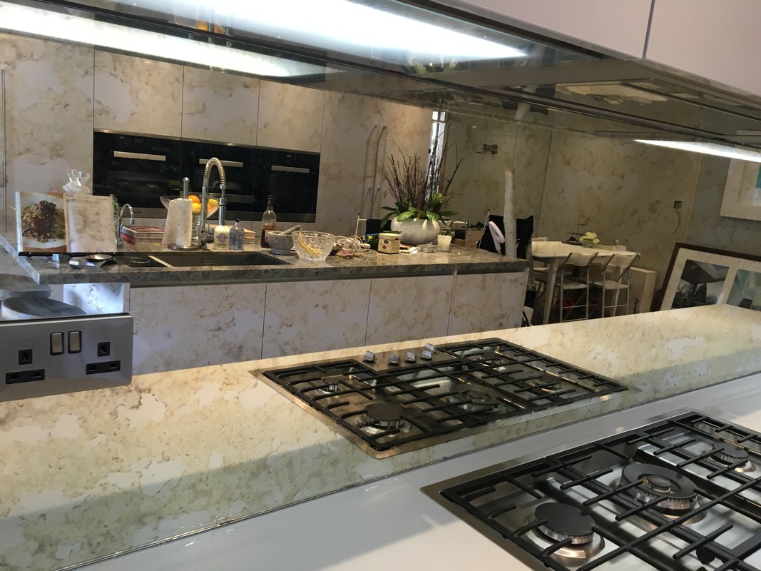 Mirror glass splashback in Watford luxury kitchen